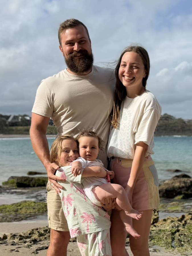 Ryan Furtner with his family at the beach